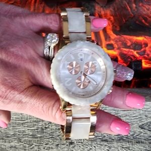 Nixon women's pearl gold watch